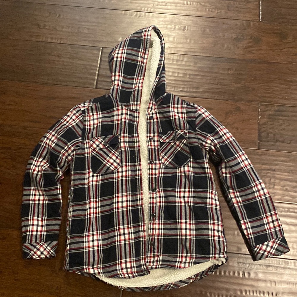 Women’s fleece flannel jacket. Hood and pockets. Excellent condition.